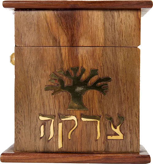A silver tzedakah box for collecting gifts.
